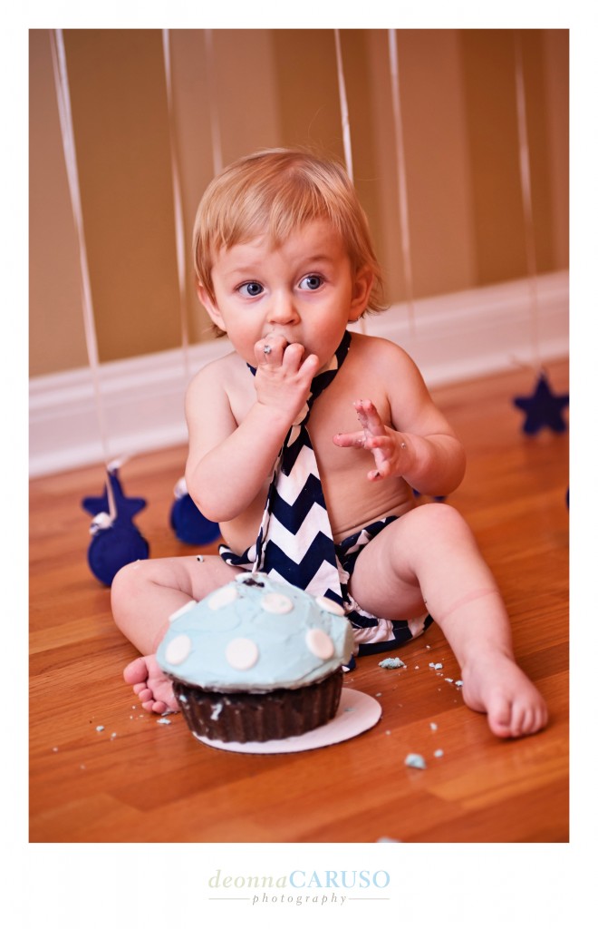 Every child enjoys his first birthday cake!
